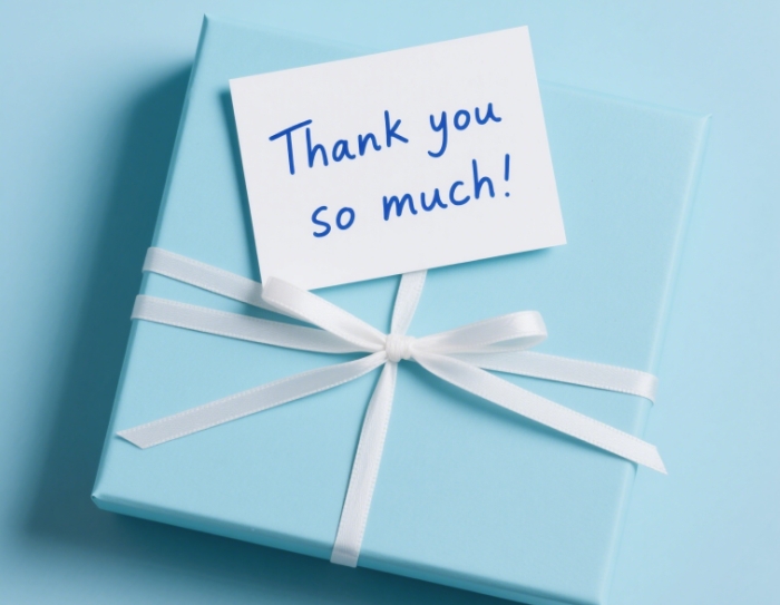 A stylish gift box with a handwritten note, symbolizing thoughtful gifting